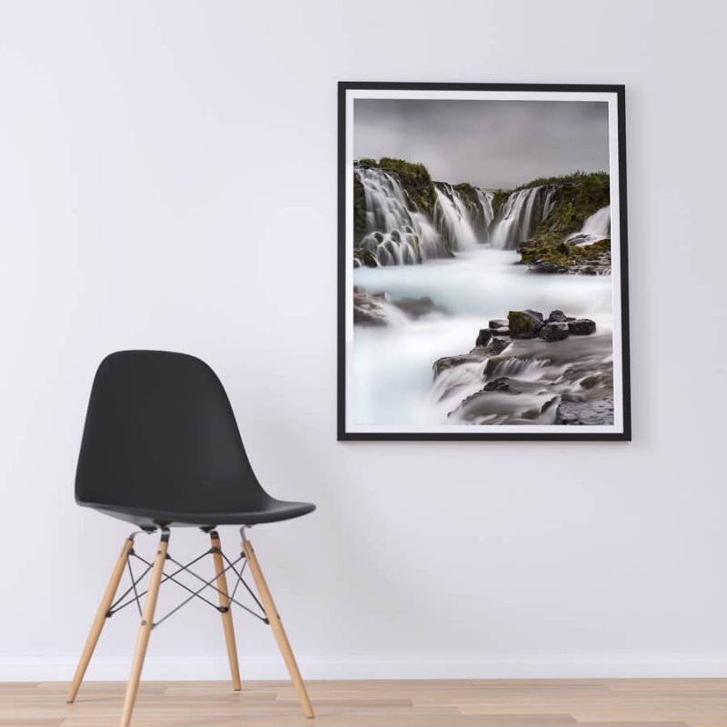 Brurafoss waterfall, small unique waterfall with vibrant blue water