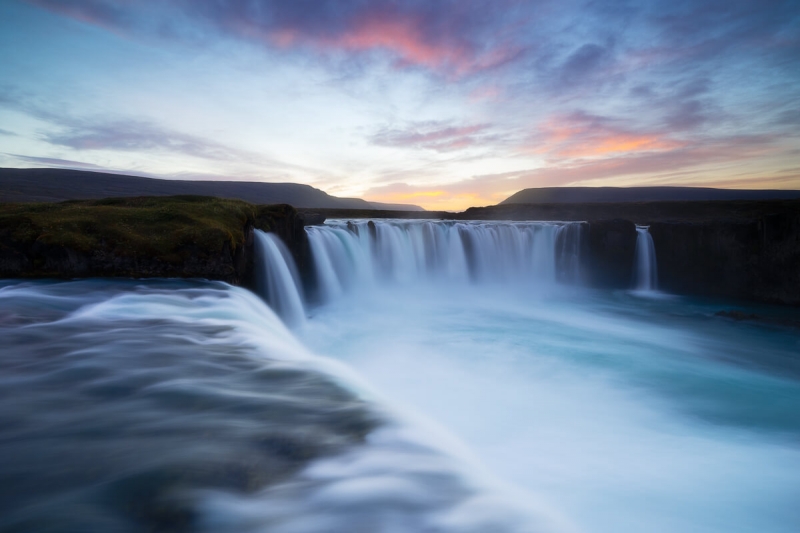 Godafoss horse shoe shaped waterfall during sunset