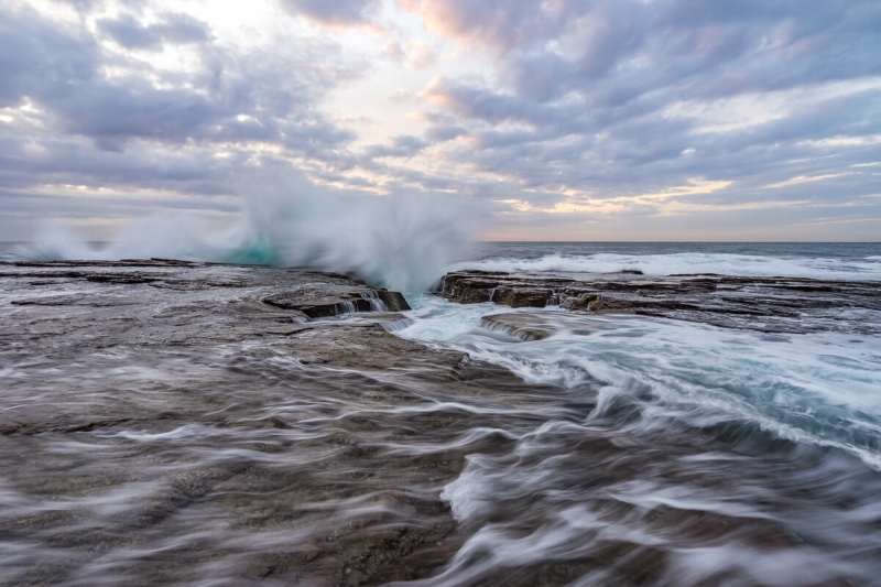 Sunrise and flowing water, North Narrabeen Beach.