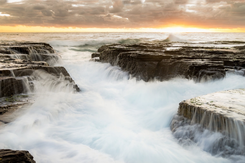 North Narrabeen rock shelf during sunrise.