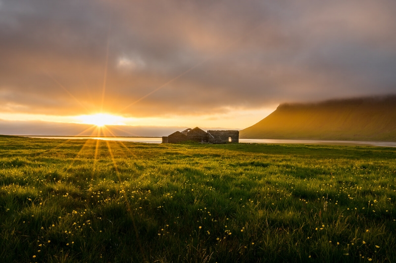 Ruin at sunset during midnight sun.