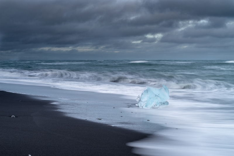 Iceberg washed up on black sand beach near Jökulsárlón