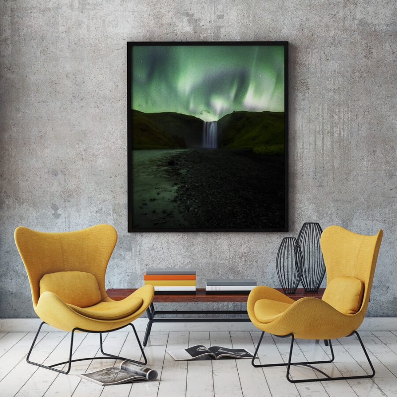 northern lights at skogarfoss waterfall iceland