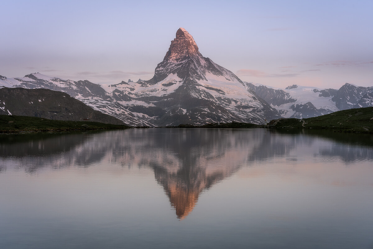 Matterhorn at sunrise, viewed across the Stellisee.